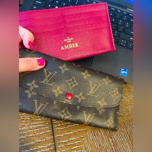 Authentic Louis Vuitton large wallet with card holder LV store did stamped.